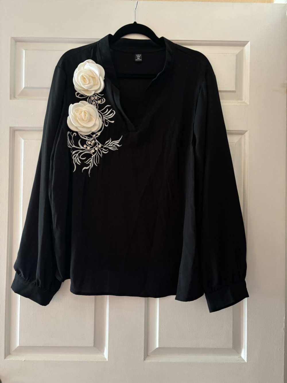 SHEIN Black Blouse with White Floral Rosette Detail